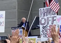 Bernie Sanders urges supporters to defend democracy at May Day rally outside City Hall